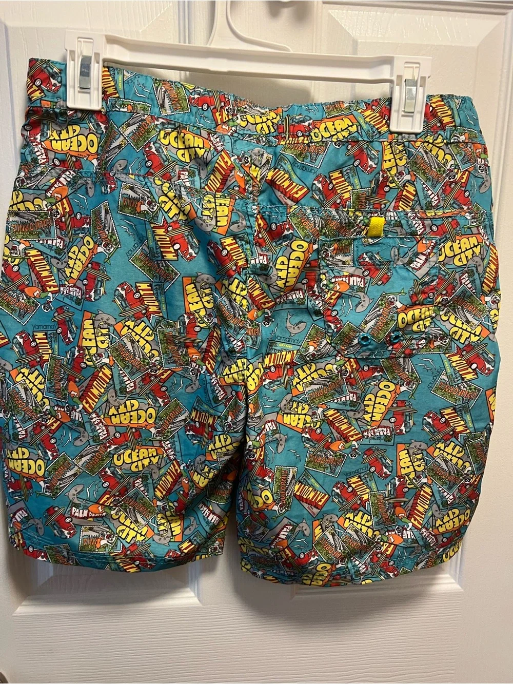 Turquoise Graphic Swim Shorts with Yellow Ocean Print
